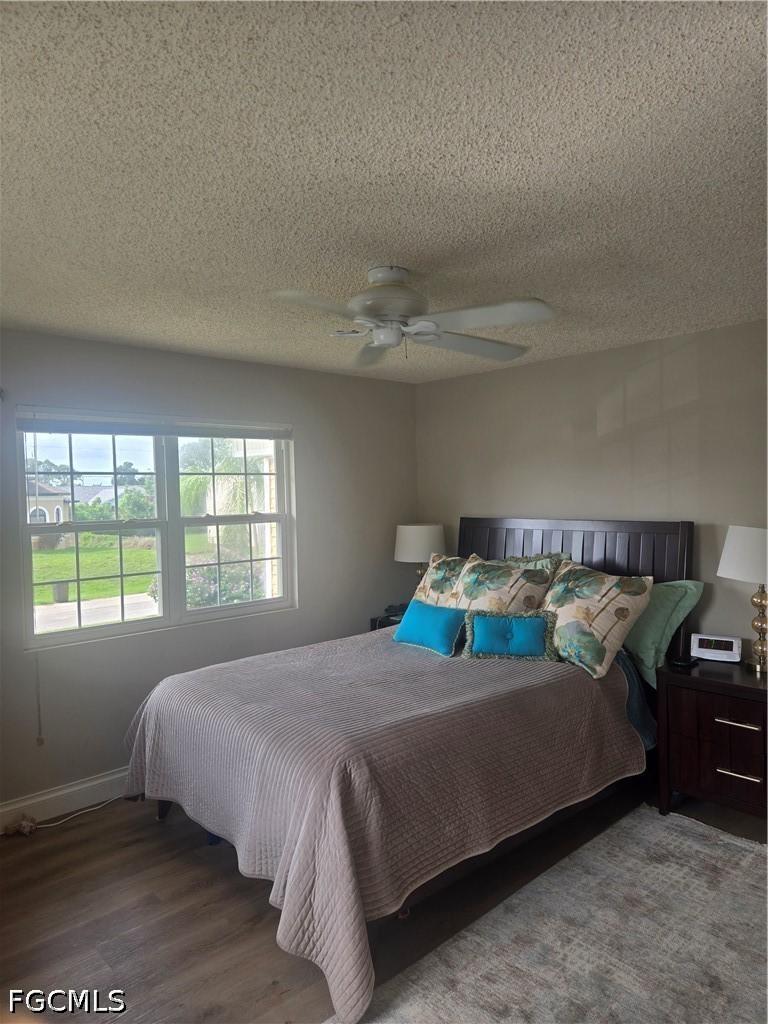 8093 Anhinga Road Fort Myers, FL 33967 - Photo 20 of 49 a bedroom with a bed and window