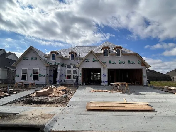 a front view of a house with entertaining space