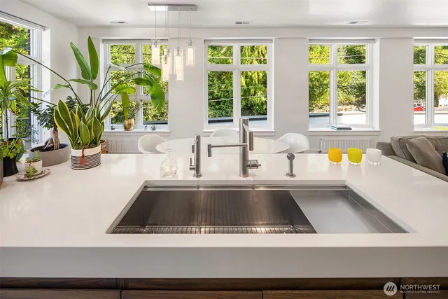 a room with a window and gym equipment