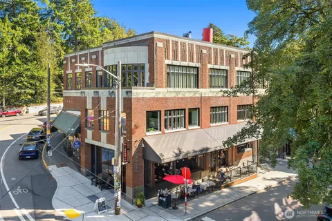 a view of a building with sitting area