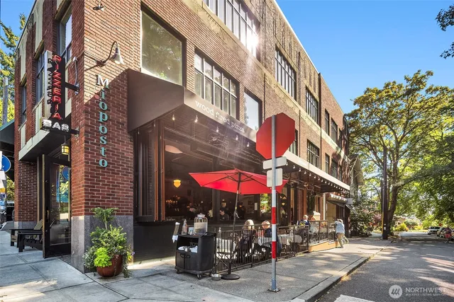 a view of a building with sitting area