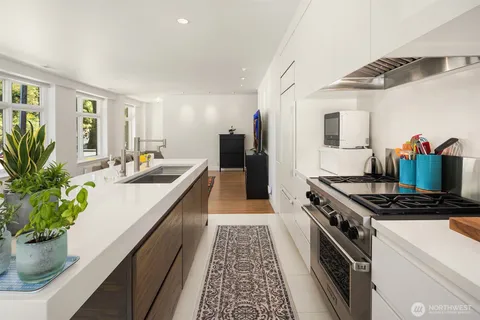 a kitchen with sink and stove