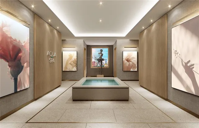 a living room with furniture a rug and a large window