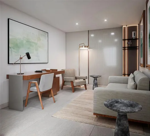 a living room with furniture and a painting