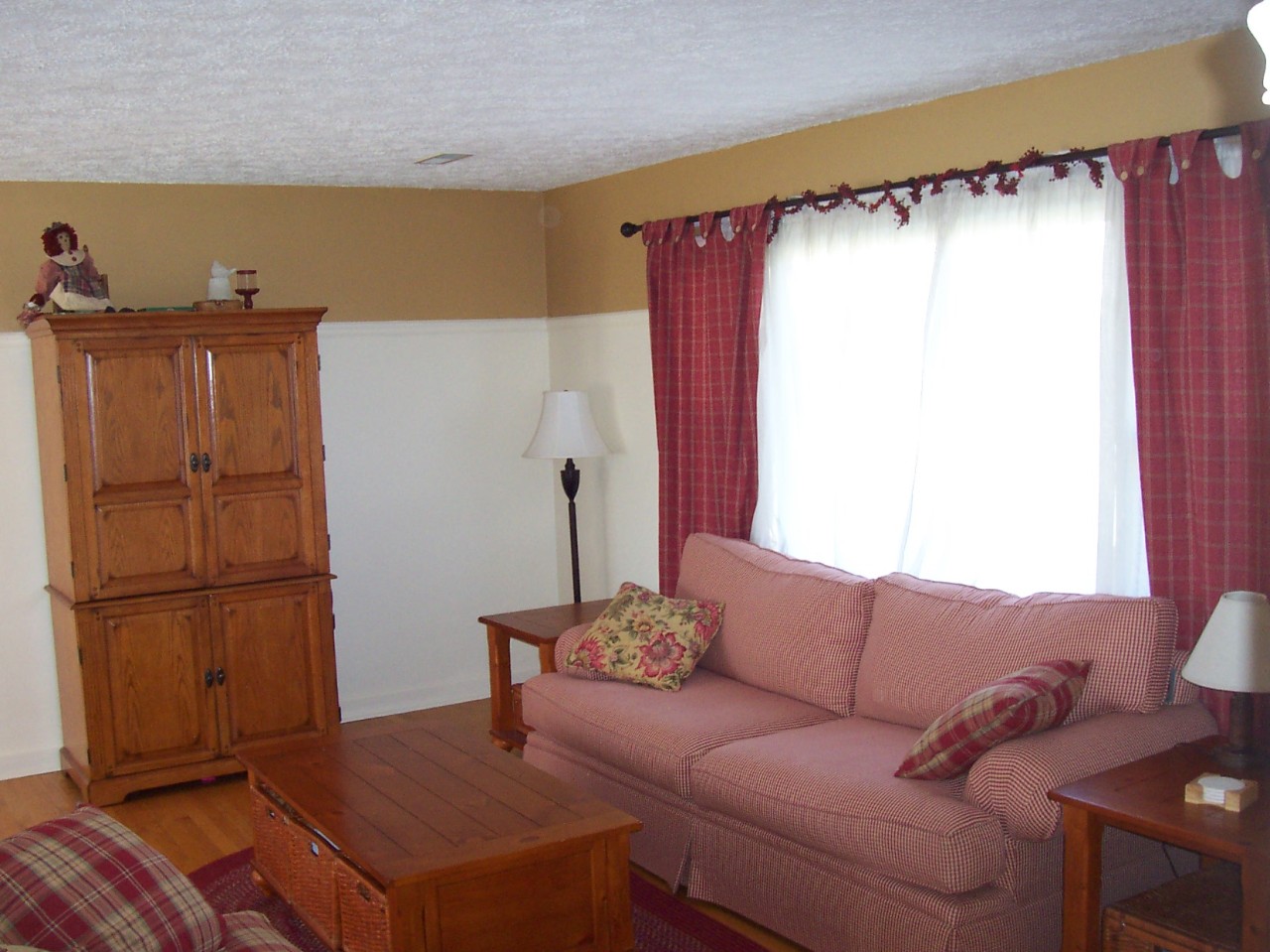 923 Olney Road Vinton, VA 24179 - Photo 2 of 6 a living room with furniture and a refrigerator