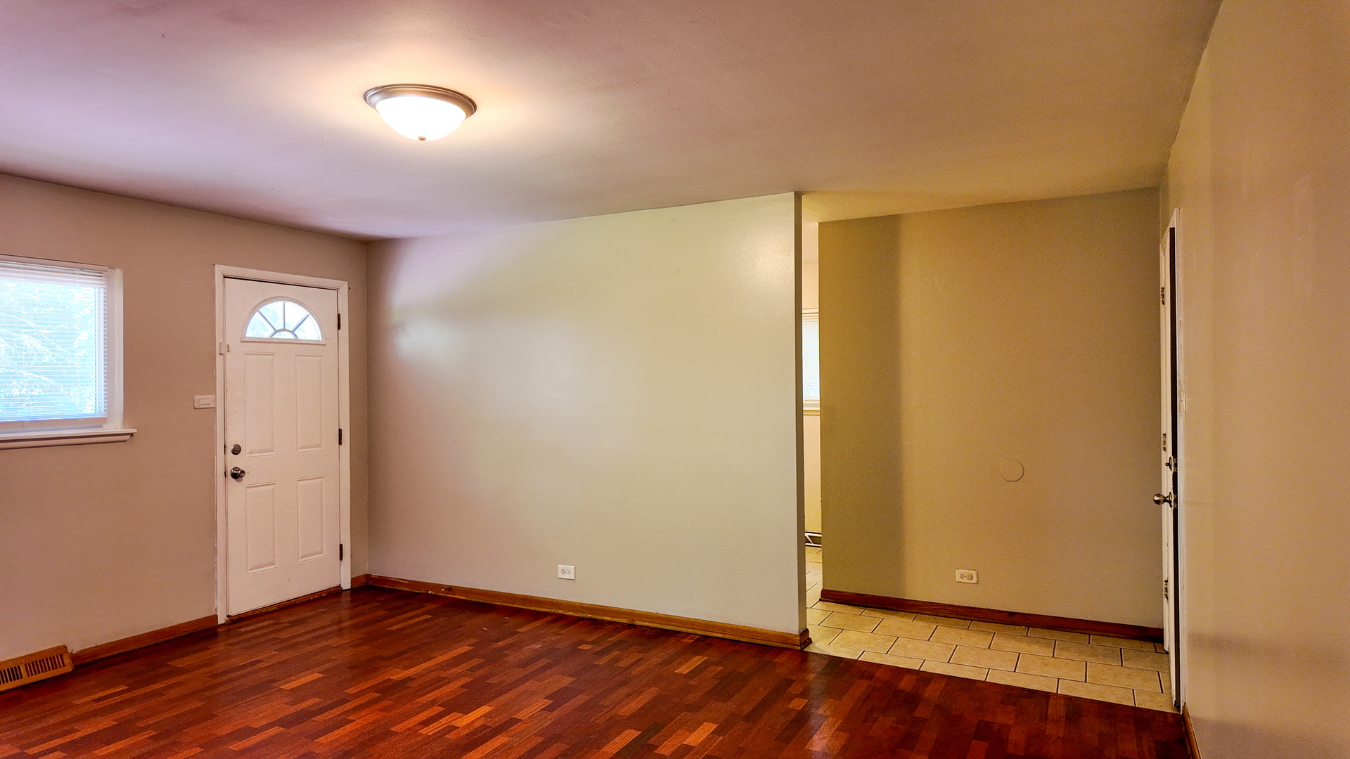 3506 Ithaca Road Olympia Fields, IL 60461 - Photo 17 of 28 an empty room with wooden floor and windows