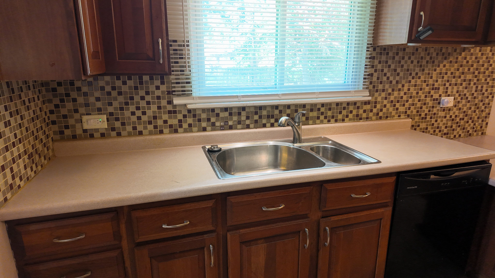 3506 Ithaca Road Olympia Fields, IL 60461 - Photo 18 of 28 a kitchen with a sink and cabinets