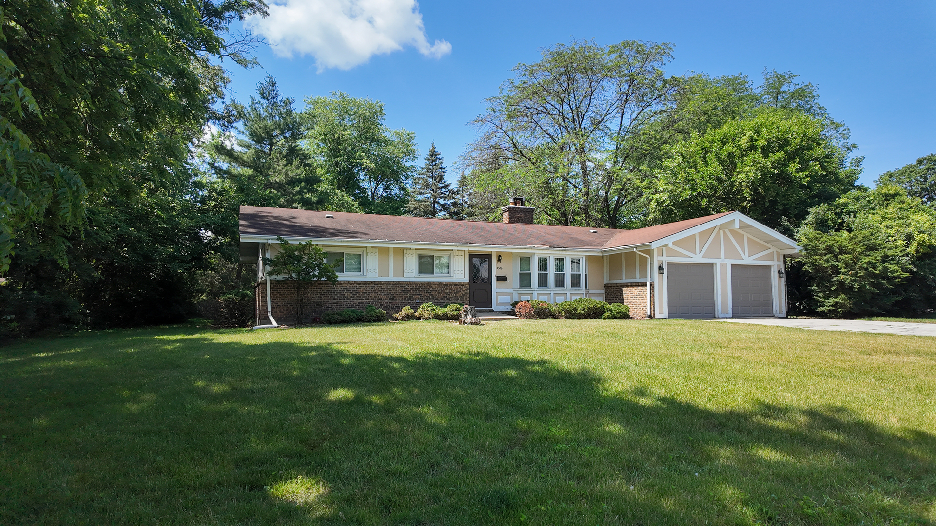 3506 Ithaca Road Olympia Fields, IL 60461 - Photo 2 of 28 a front view of a house with a garden