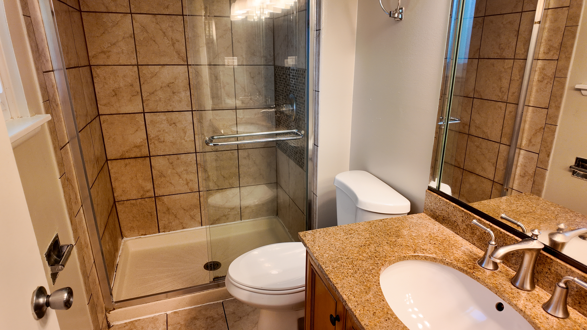 3506 Ithaca Road Olympia Fields, IL 60461 - Photo 26 of 28 a bathroom with a granite countertop toilet sink and shower