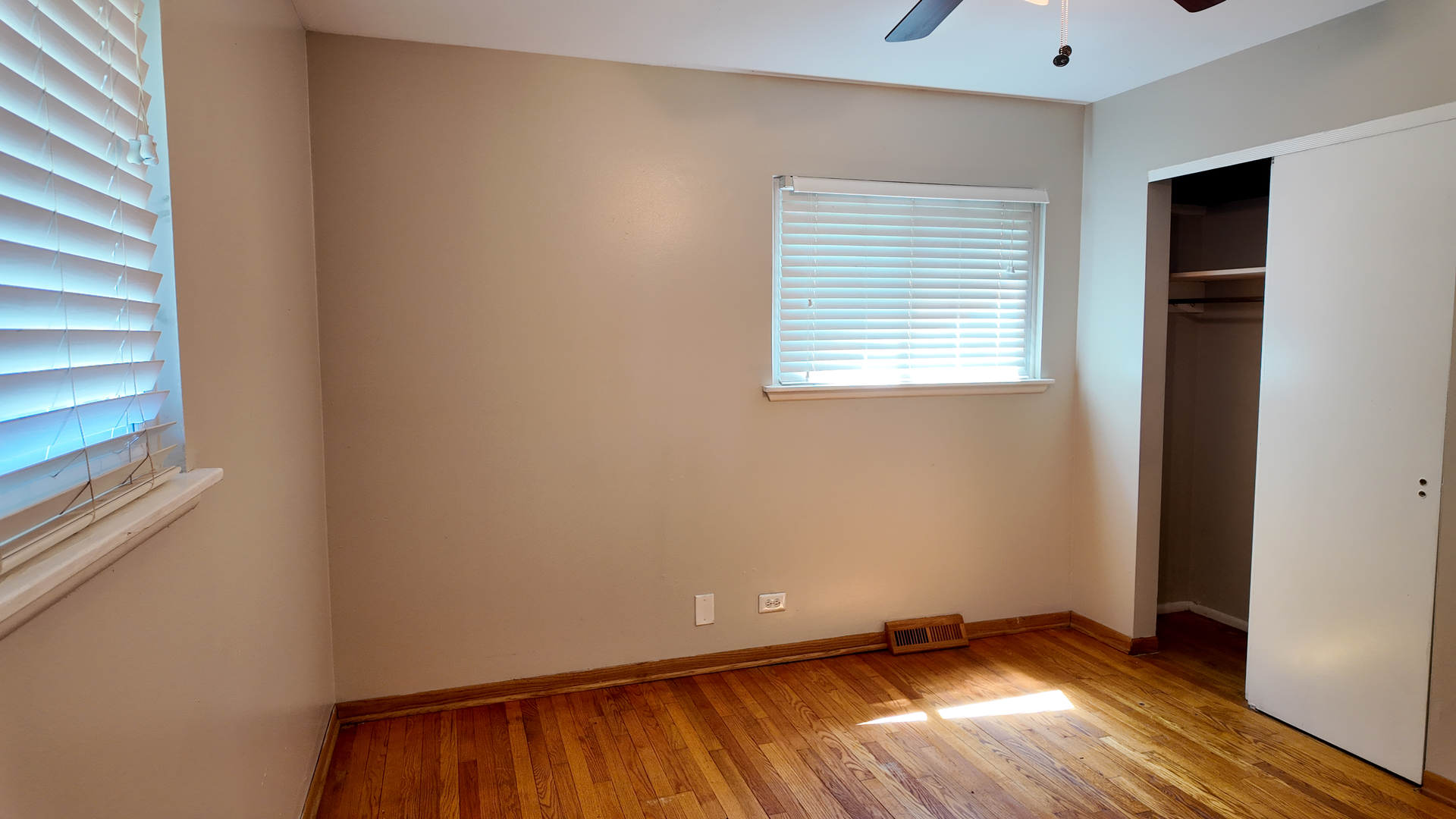 3506 Ithaca Road Olympia Fields, IL 60461 - Photo 28 of 28 a view of an empty room with wooden floor and a window