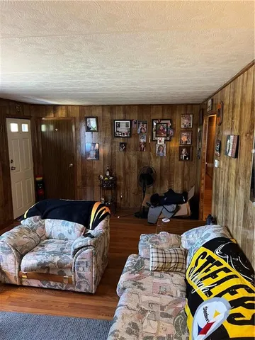 a bedroom with bed and a window