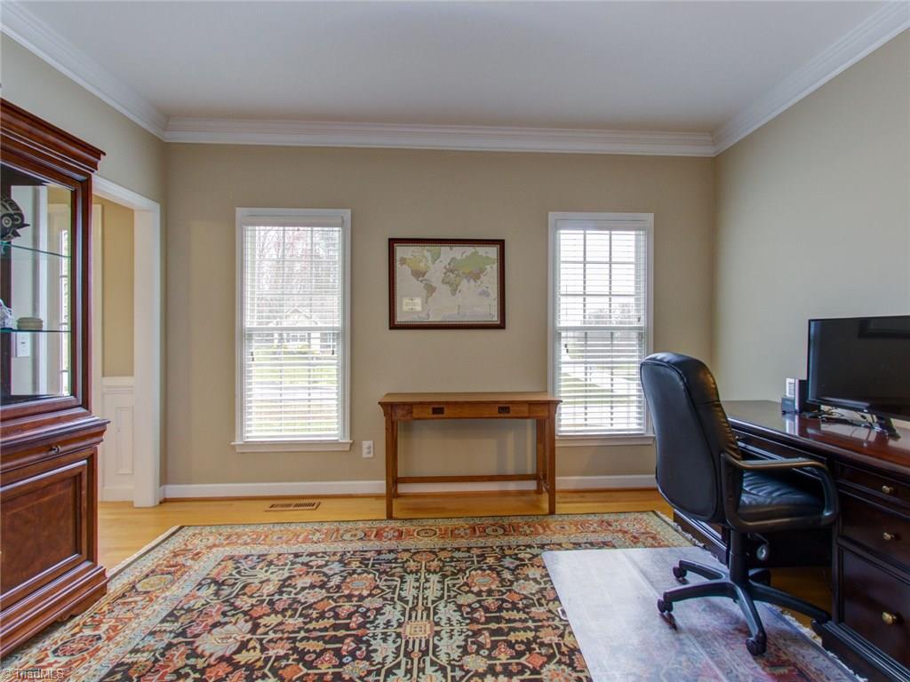 8118 Chestershire Road Oak Ridge, NC 27310 - Photo 3 of 19 Seller use the Den for an office. A good place for the piano too!