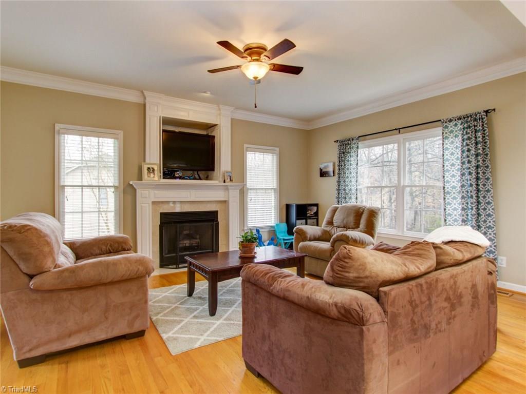 8118 Chestershire Road Oak Ridge, NC 27310 - Photo 10 of 19 Fireplace has gas logs too.