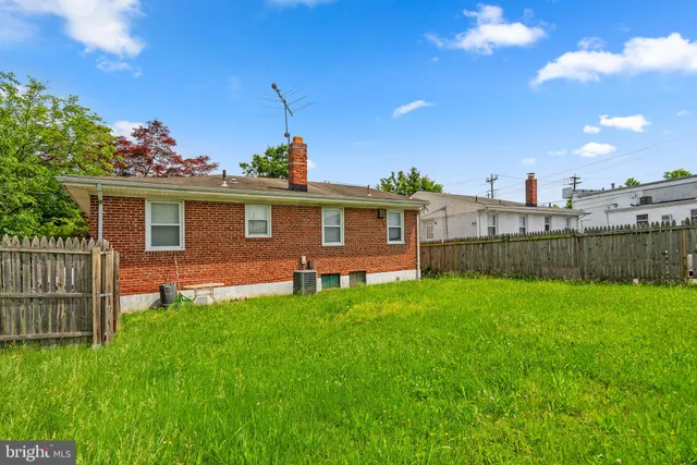 a view of a backyard with a garden