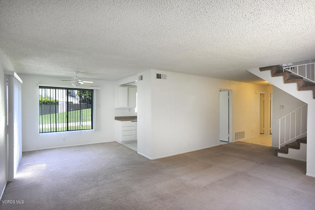 5711 Cochran Street Simi Valley, CA 93063 - Photo 3 of 25 a view of an empty room with a window