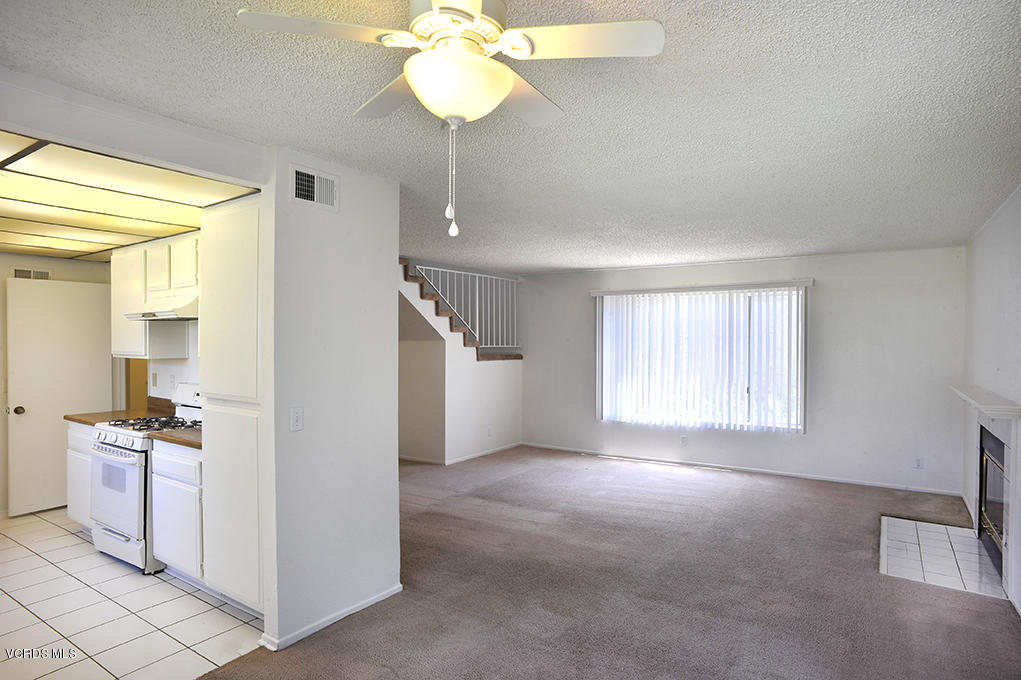 5711 Cochran Street Simi Valley, CA 93063 - Photo 4 of 25 a view of a kitchen and an empty room