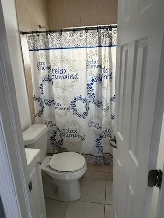 a view of a livingroom with a staircase