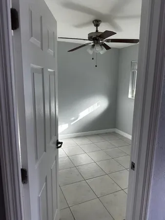 a view of a hallway and closet