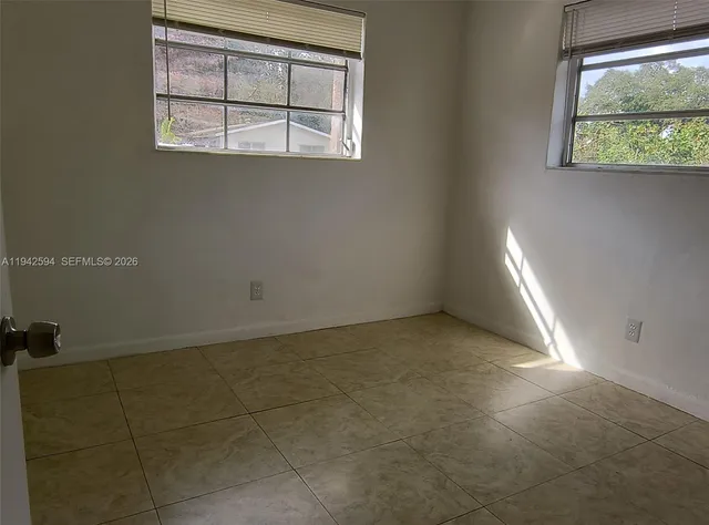 an empty room with a window