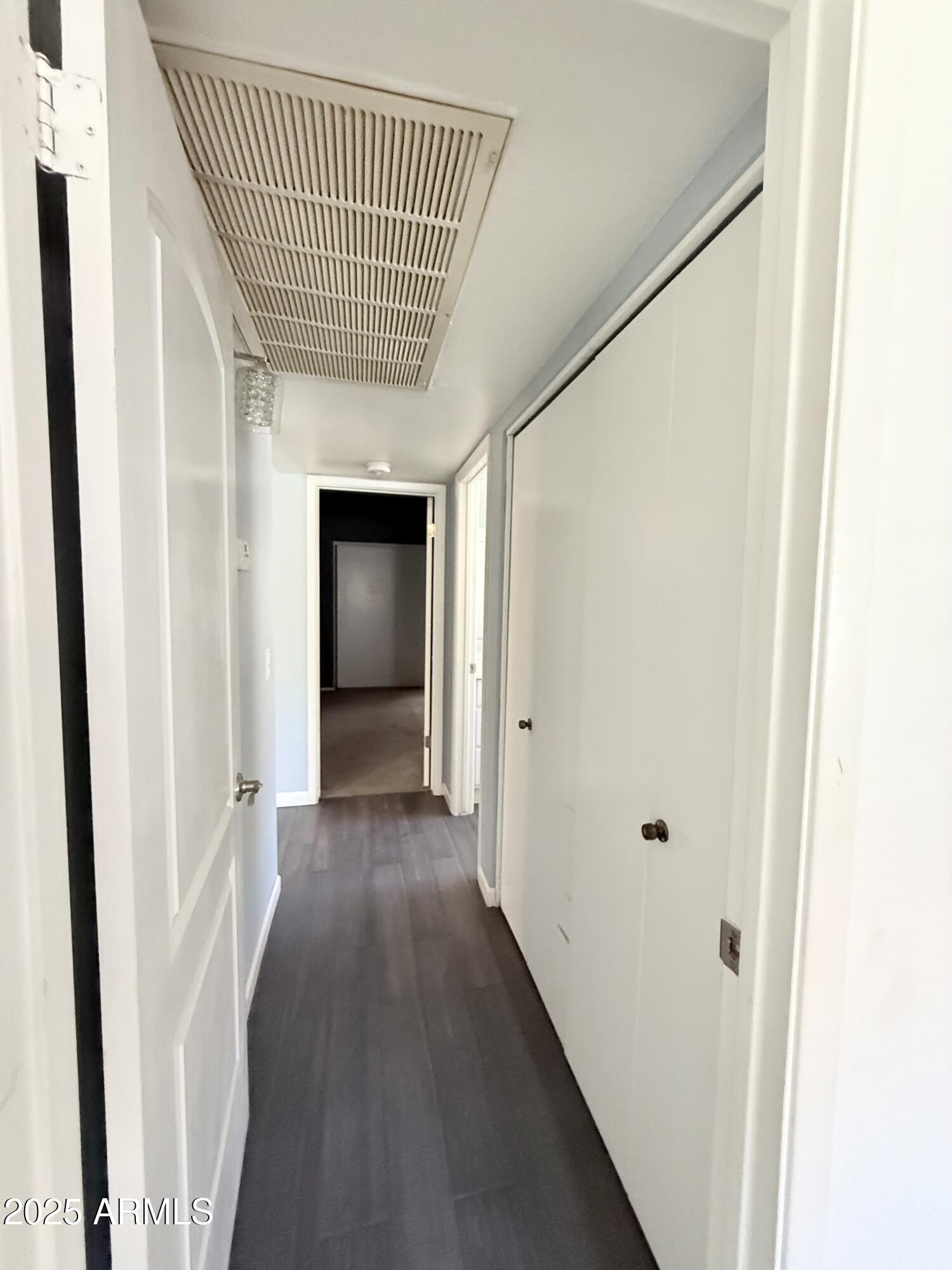 11666 North 28th Drive, Unit 155 Phoenix, AZ 85029 - Photo 16 of 28 a view of hallway with wooden floor