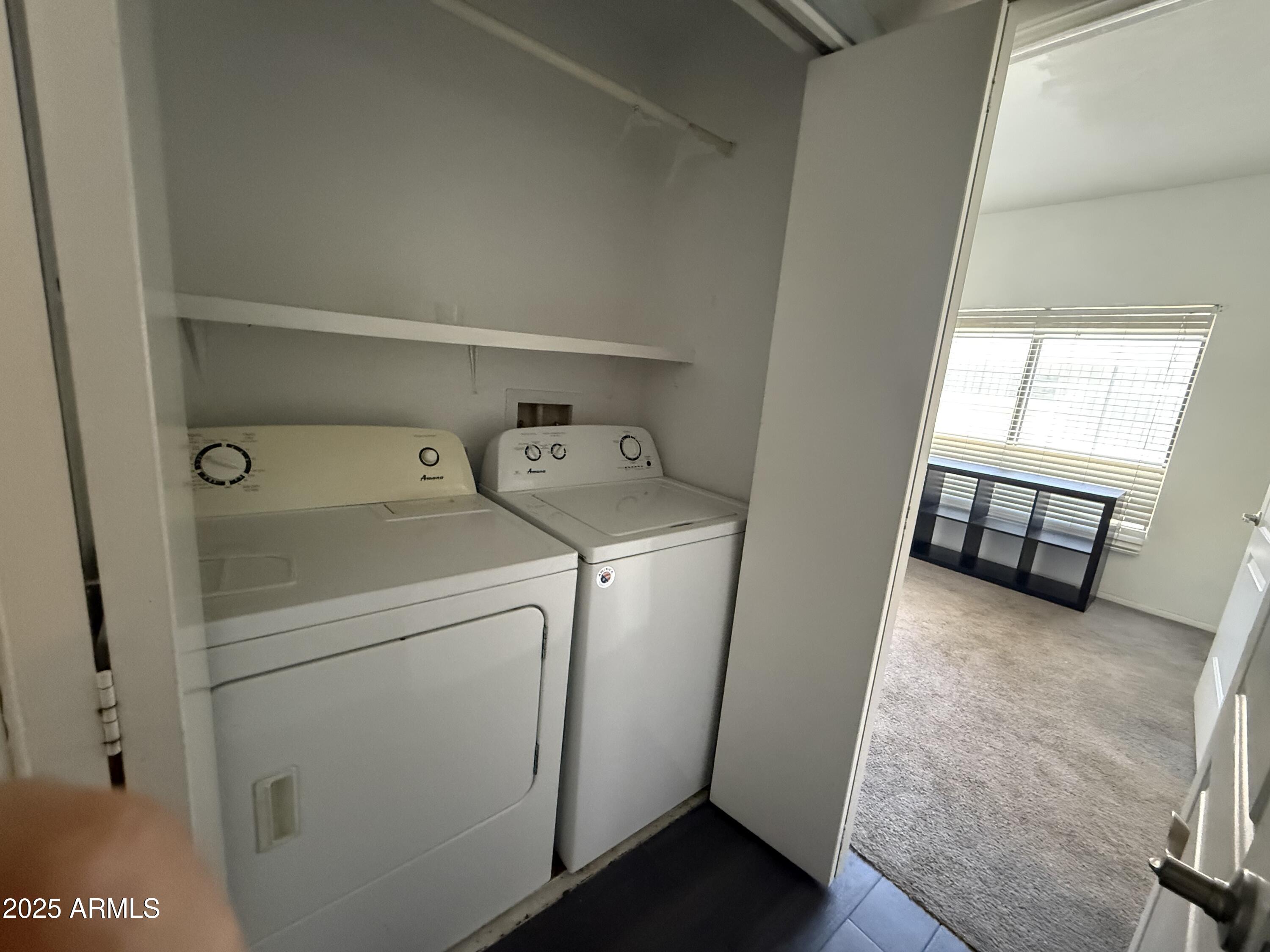 11666 North 28th Drive, Unit 155 Phoenix, AZ 85029 - Photo 17 of 28 a utility room with dryer and washer