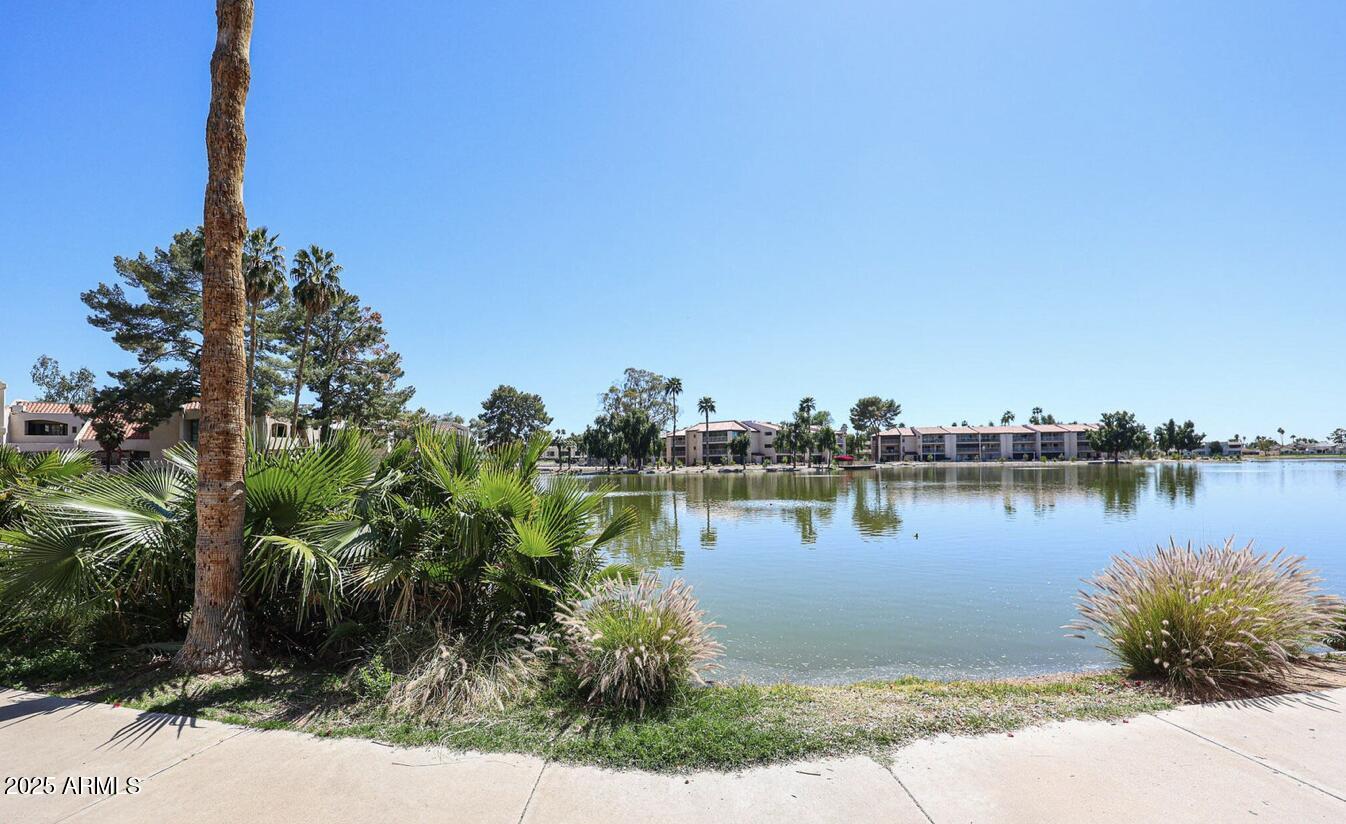 11666 North 28th Drive, Unit 155 Phoenix, AZ 85029 - Photo 28 of 28 a view of a large body of water surrounded by trees
