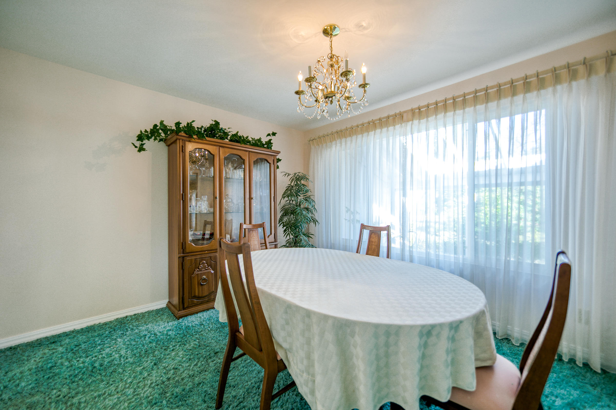 8442 Ranchette Drive Redding, CA 96001 - Photo 12 of 26 a view of a dining room with furniture window and outside view