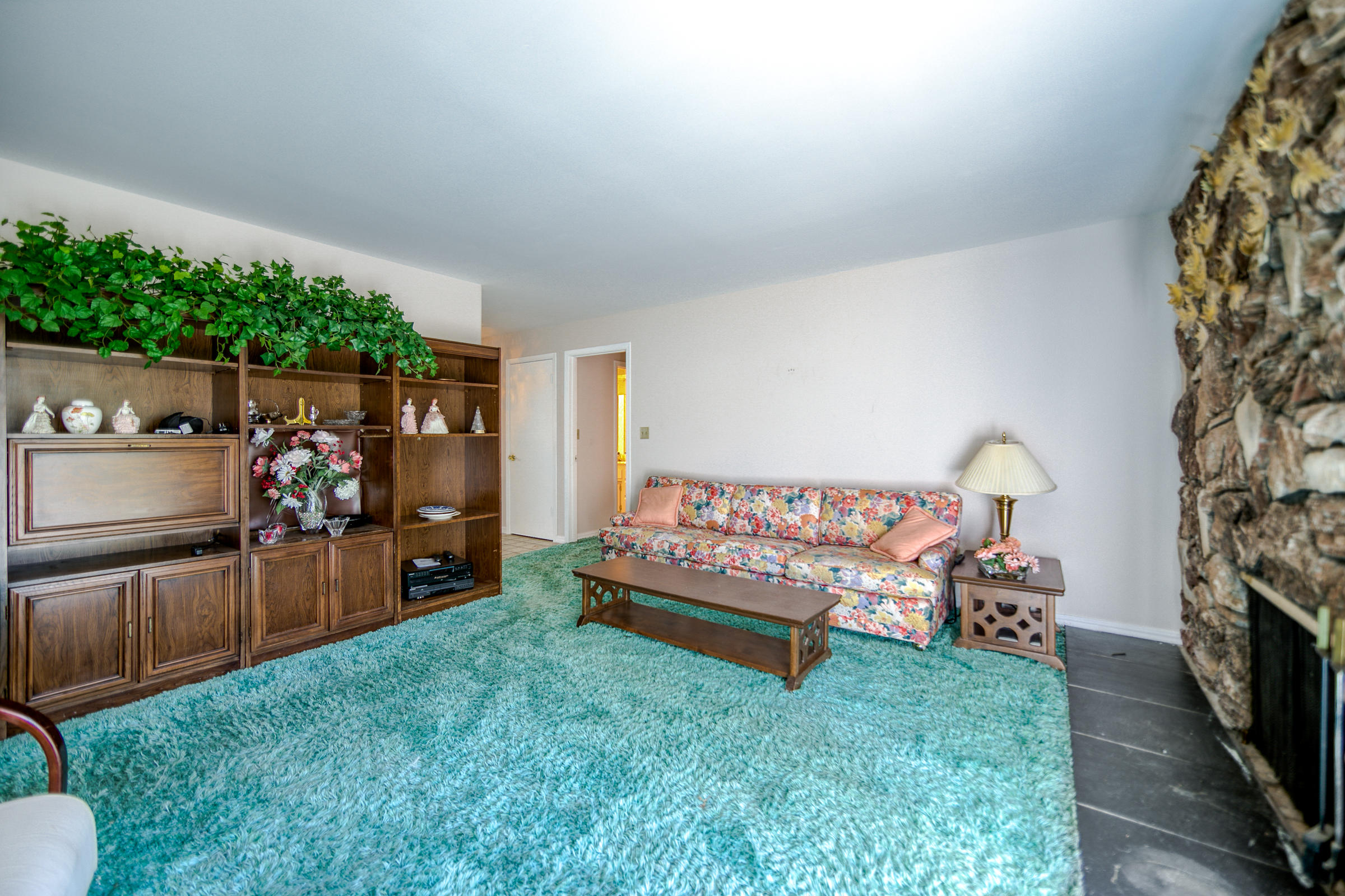 8442 Ranchette Drive Redding, CA 96001 - Photo 14 of 26 a living room with furniture and a flat tv screen