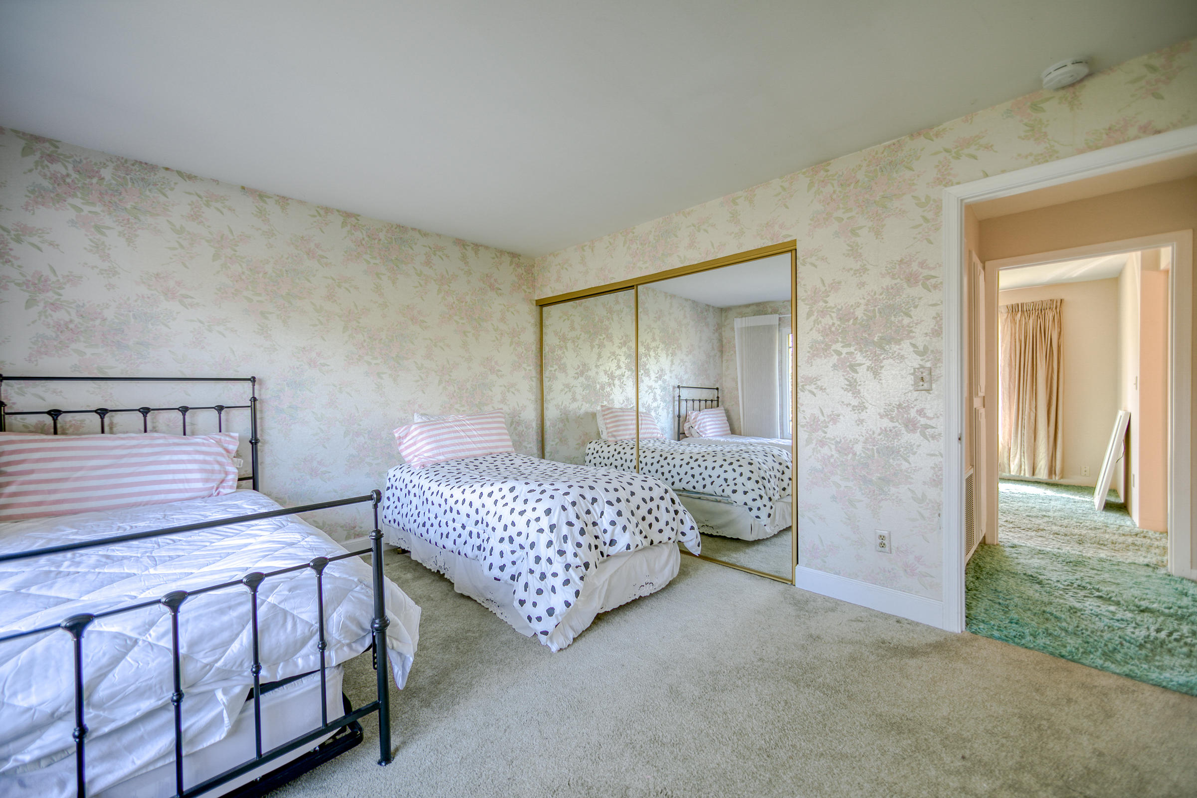 8442 Ranchette Drive Redding, CA 96001 - Photo 18 of 26 a bedroom with two beds and painted walls