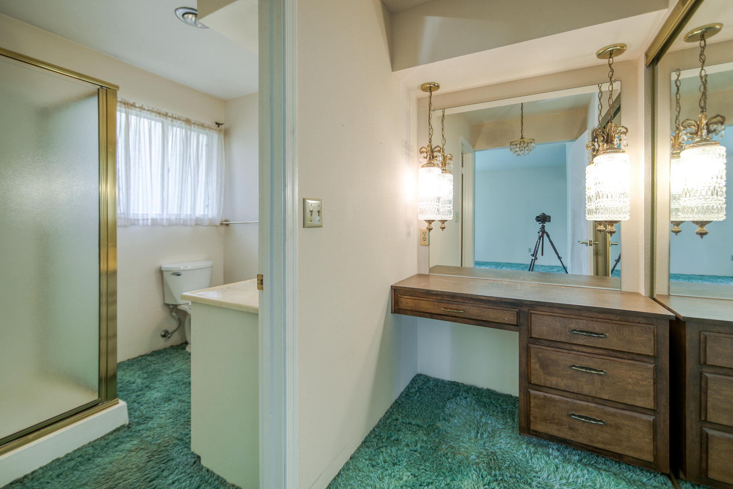 8442 Ranchette Drive Redding, CA 96001 - Photo 21 of 26 a view of hallway with sink and wooden floor