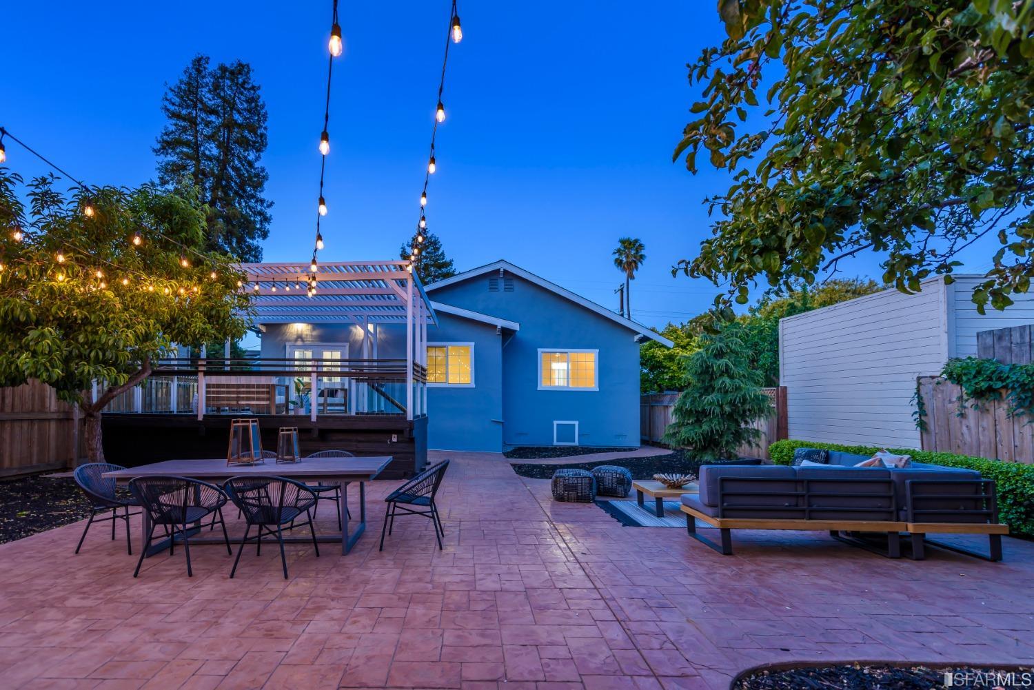 9 Bancroft Road Burlingame, CA 94010 - Photo 14 of 45 a view of a chairs and tables in the back yard of the house