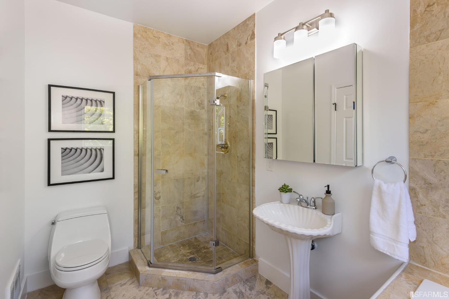 9 Bancroft Road Burlingame, CA 94010 - Photo 22 of 45 a bathroom with a sink toilet and shower