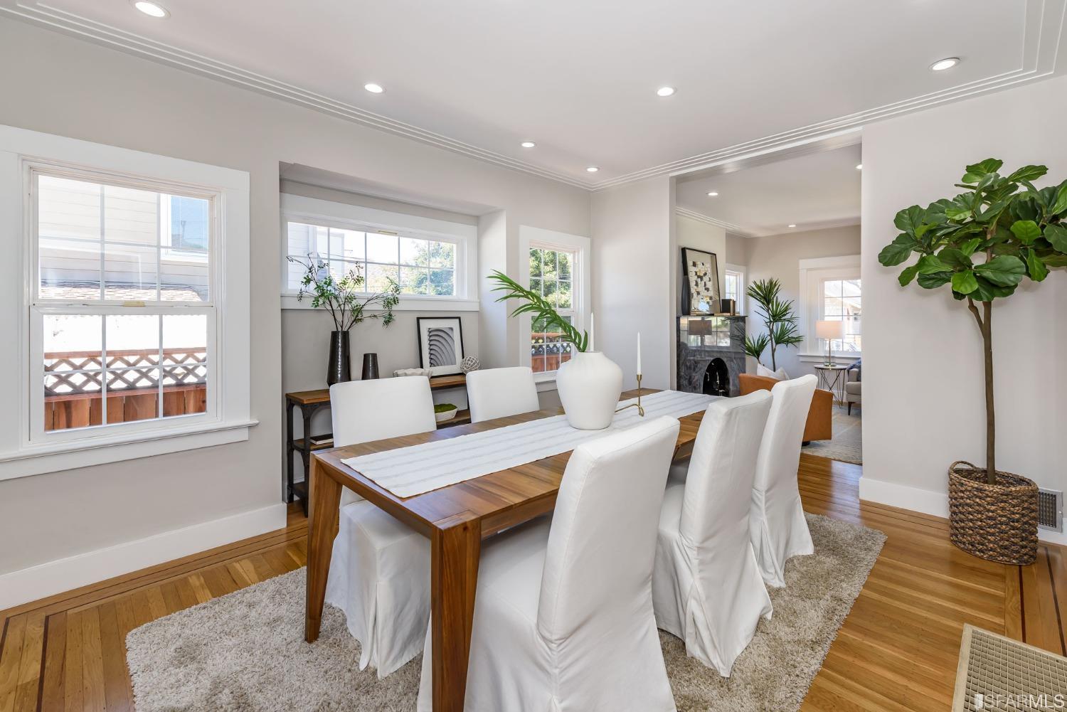 9 Bancroft Road Burlingame, CA 94010 - Photo 27 of 45 a view of a dining room with furniture window and wooden floor