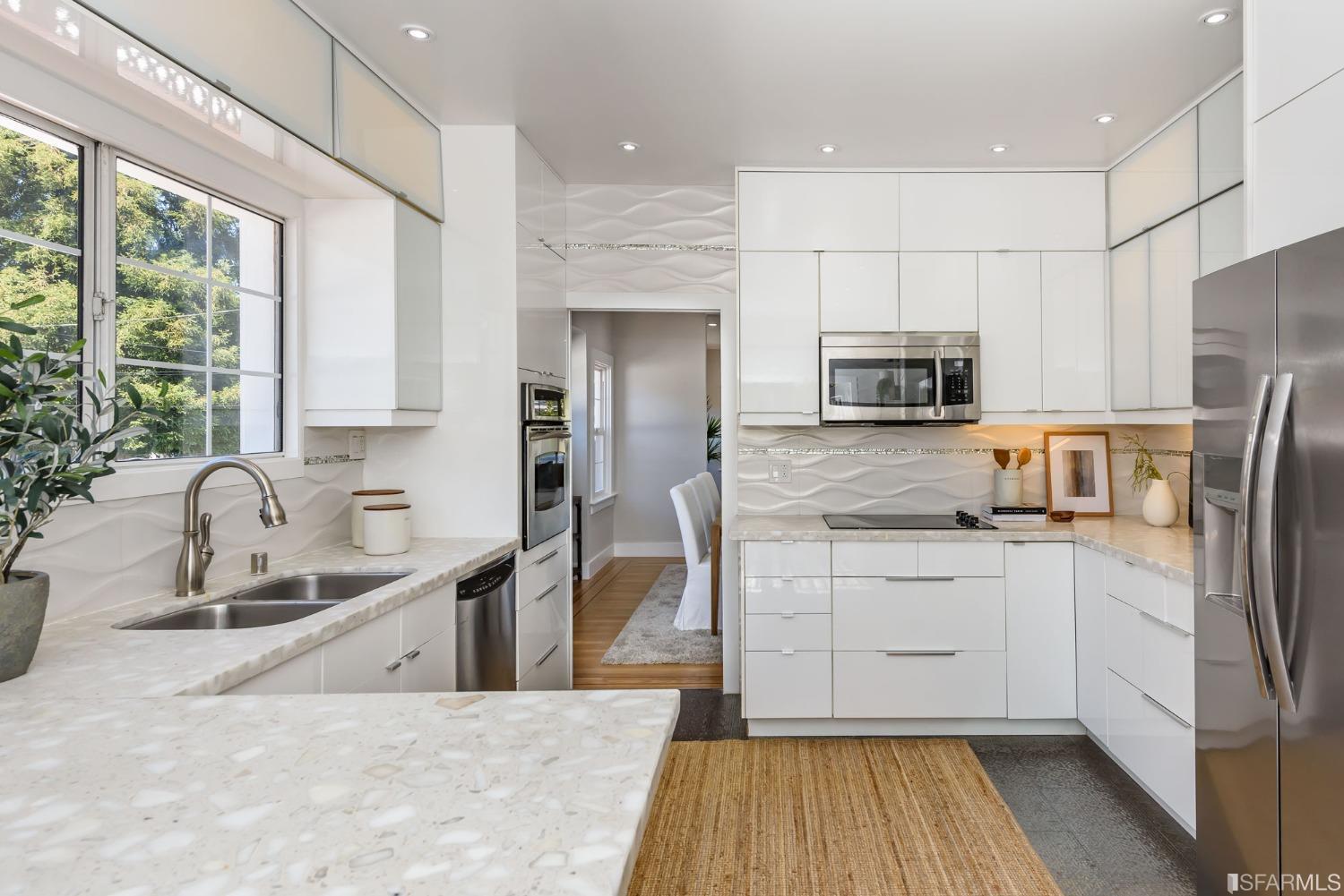 9 Bancroft Road Burlingame, CA 94010 - Photo 29 of 45 a kitchen with stainless steel appliances granite countertop a refrigerator sink and stove