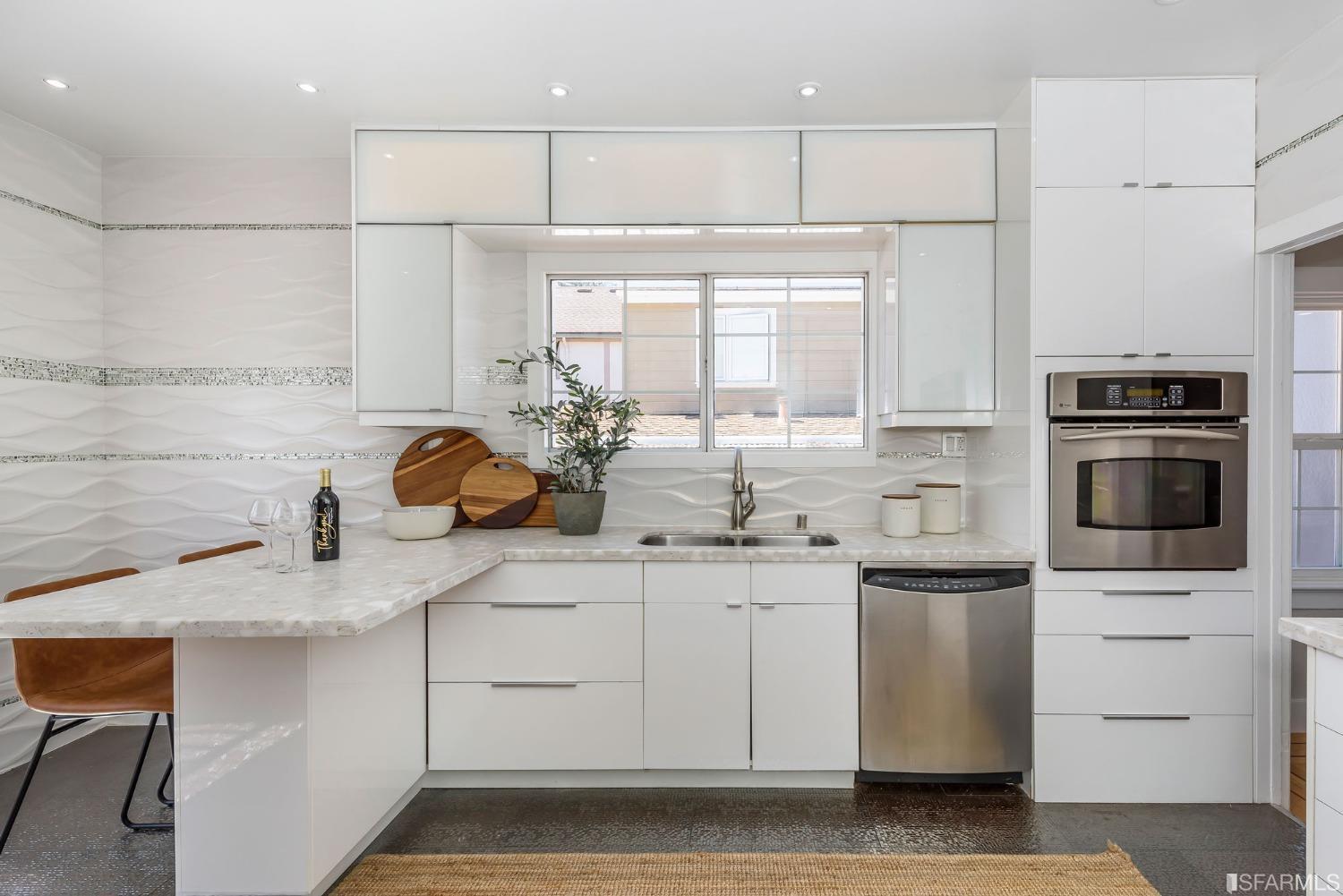 9 Bancroft Road Burlingame, CA 94010 - Photo 32 of 45 a kitchen with a sink cabinets and appliances