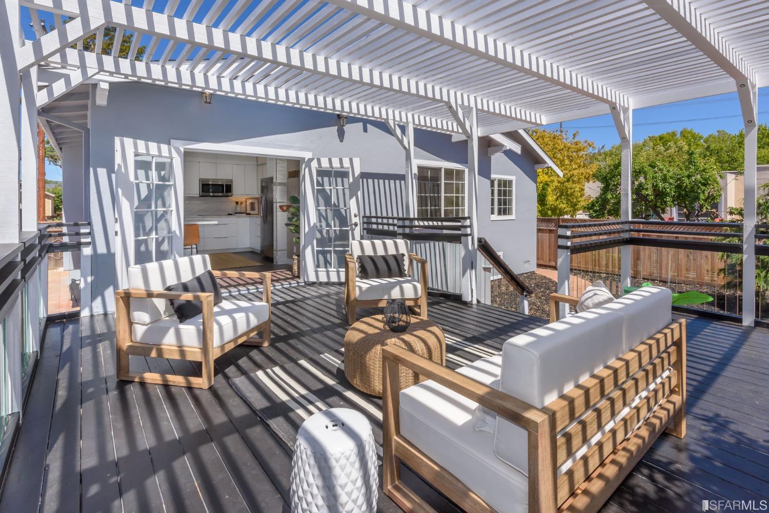 9 Bancroft Road Burlingame, CA 94010 - Photo 33 of 45 a view of a patio with couches chairs and wooden floor