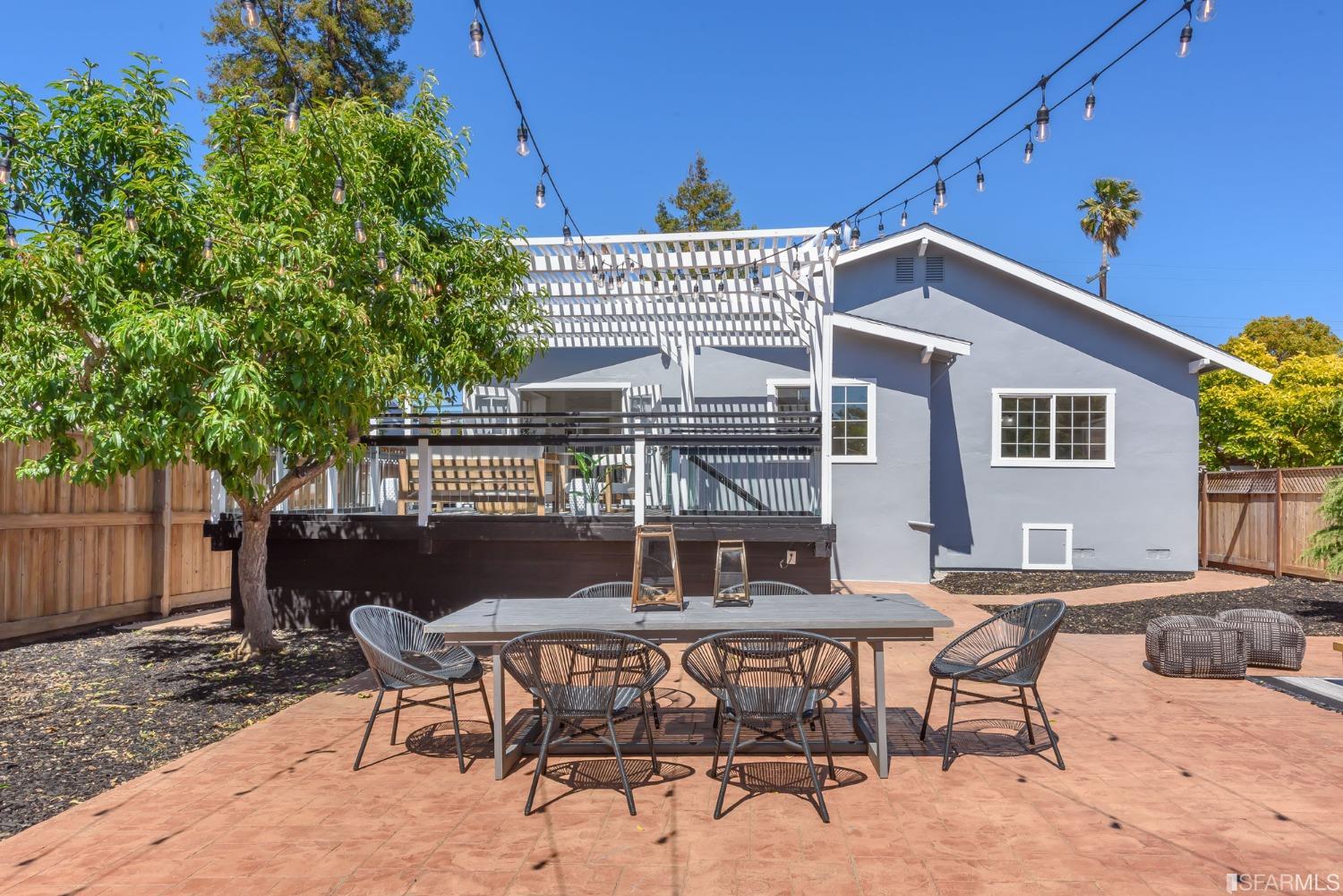 9 Bancroft Road Burlingame, CA 94010 - Photo 35 of 45 a roof deck with table and chairs and potted plants