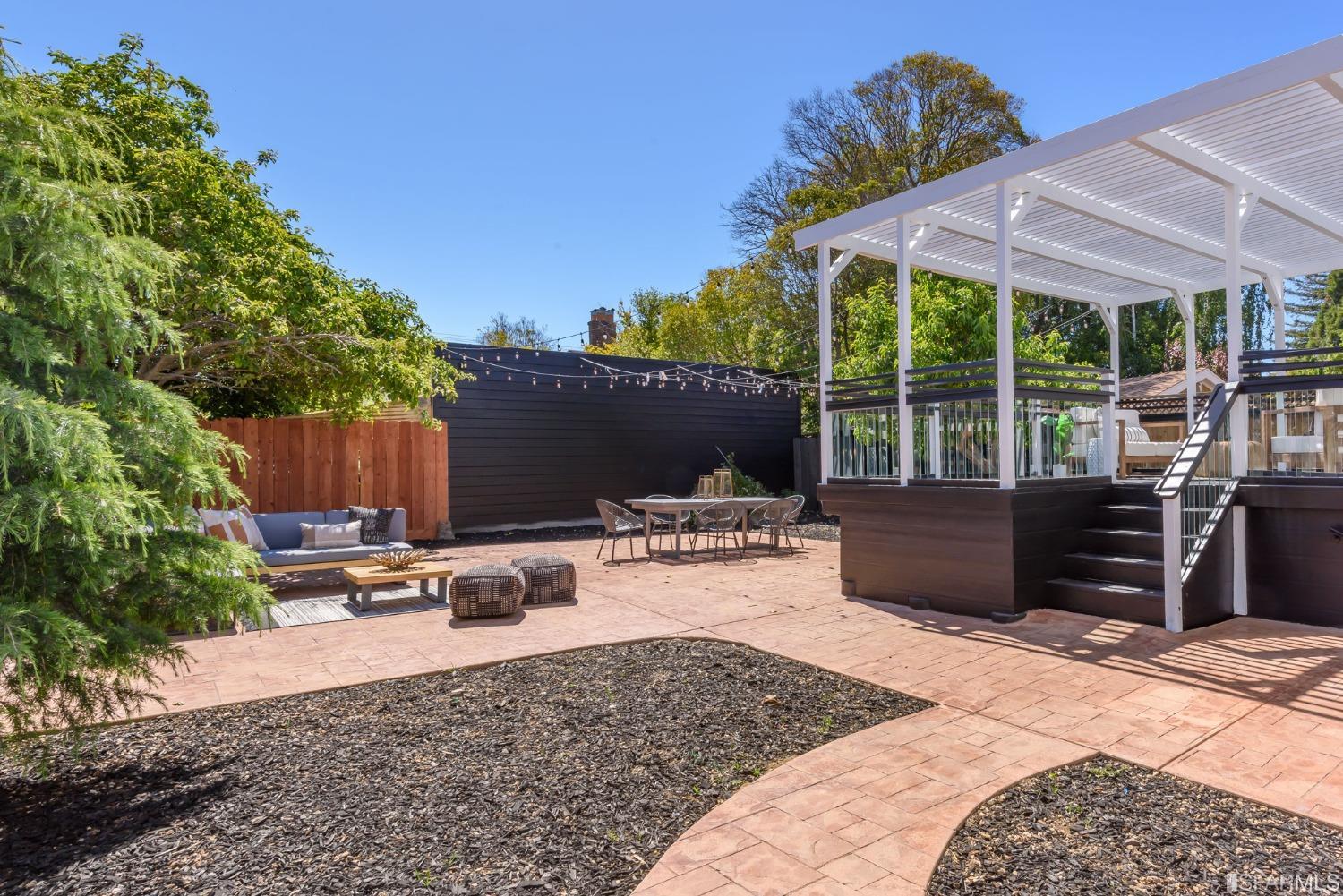 9 Bancroft Road Burlingame, CA 94010 - Photo 36 of 45 a view of a backyard with sitting area and furniture