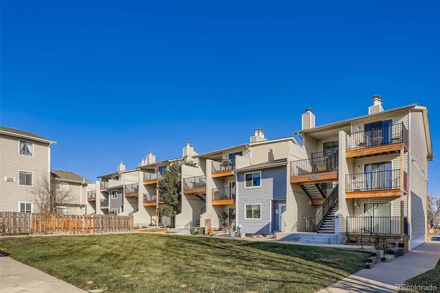 a front view of a building with large windows
