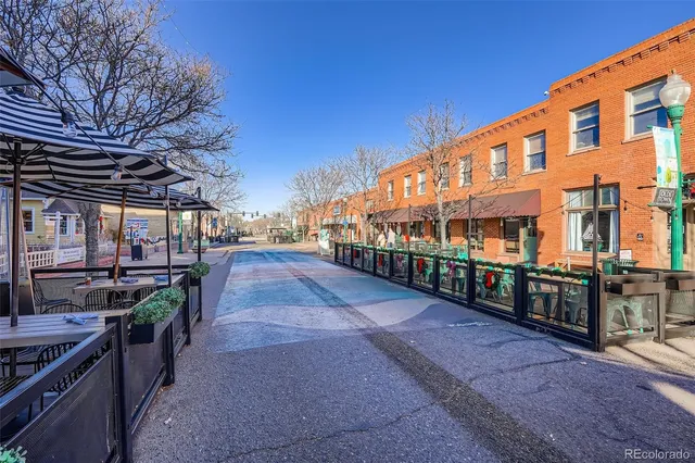 a city street lined with tall buildings