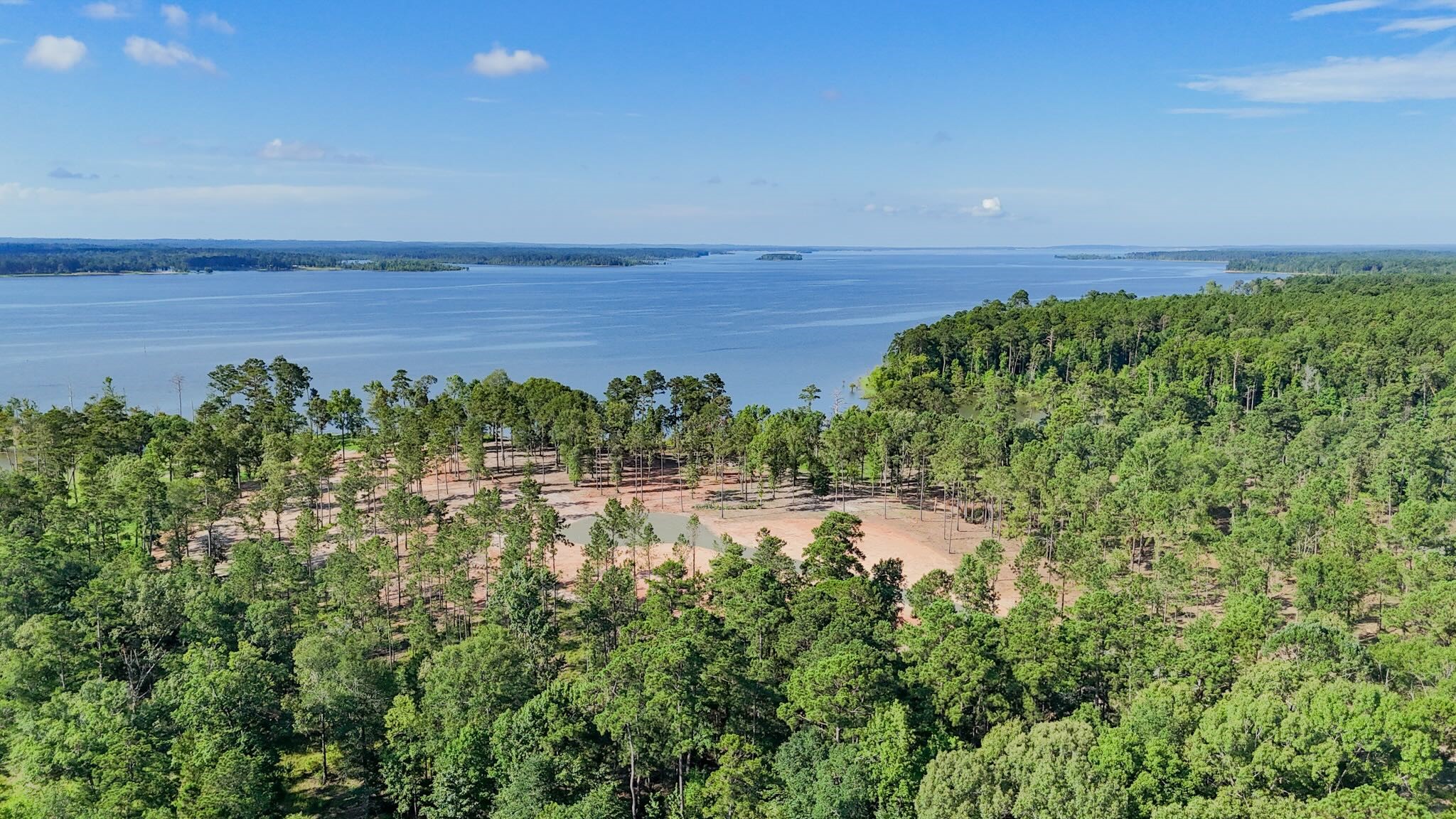358 Debbie Lane Bronson, TX 75930 - Photo 14 of 19 a view of a lake with a yard