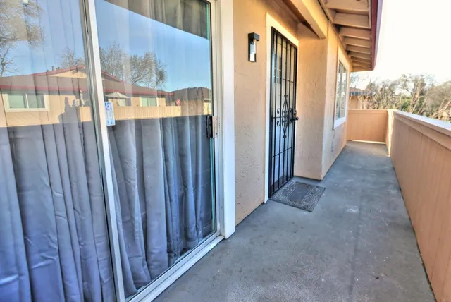 a kitchen with stainless steel appliances a refrigerator stove microwave and sink