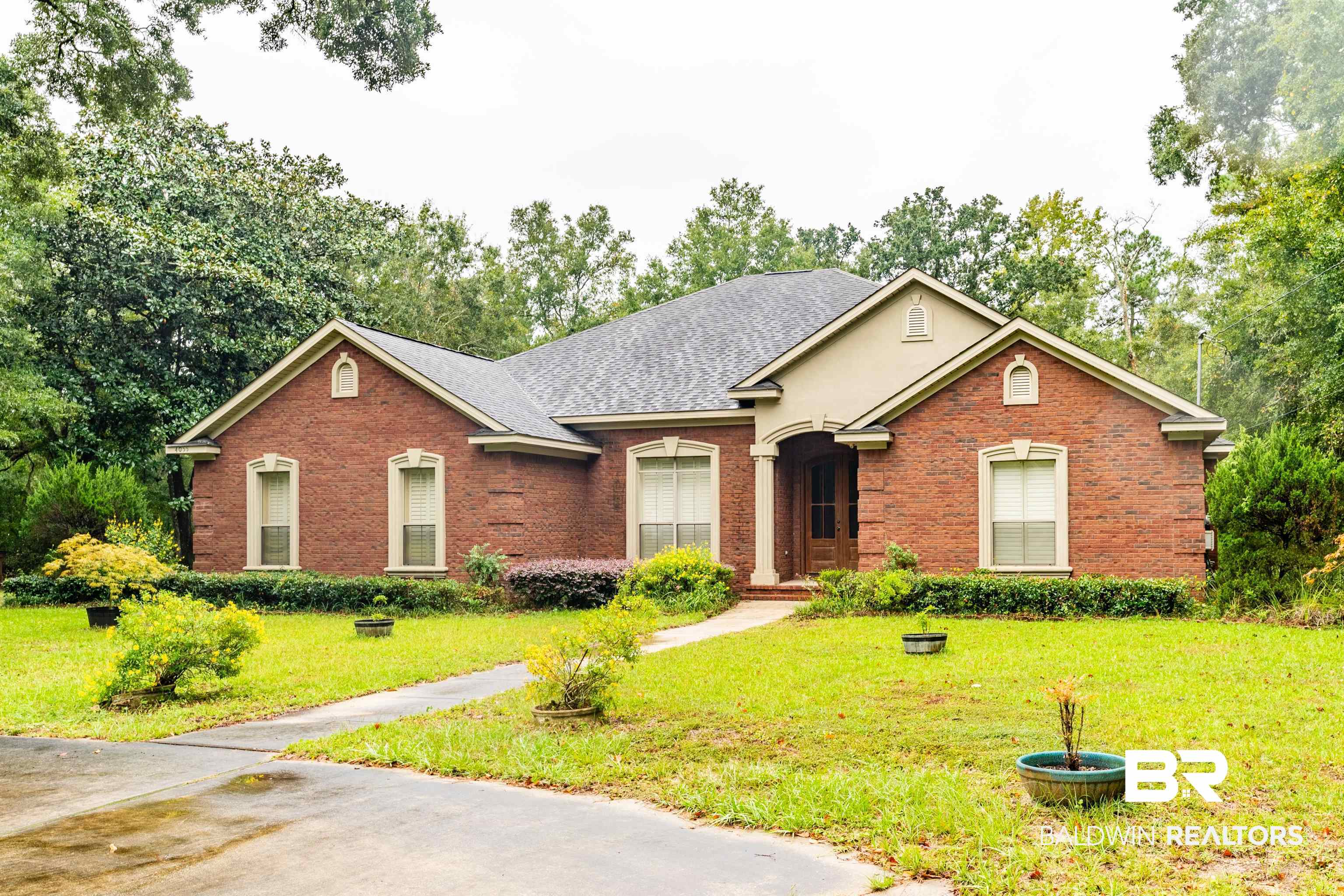 4055 Riviere Du Chien Road Mobile, AL 36693 - Photo 59 of 63 Ranch-style house featuring a front lawn