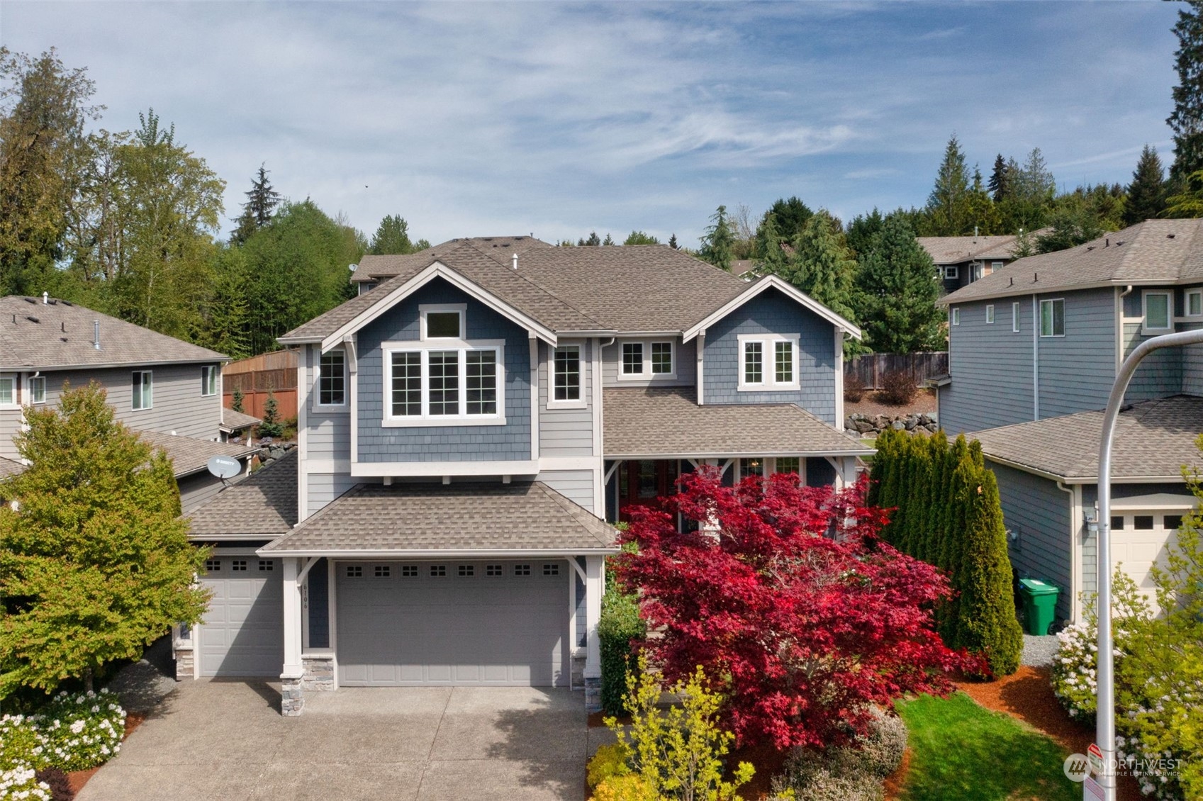 6106 Southeast 2nd Street Renton, WA 98059 - Photo 1 of 1 a front view of a house with a garden