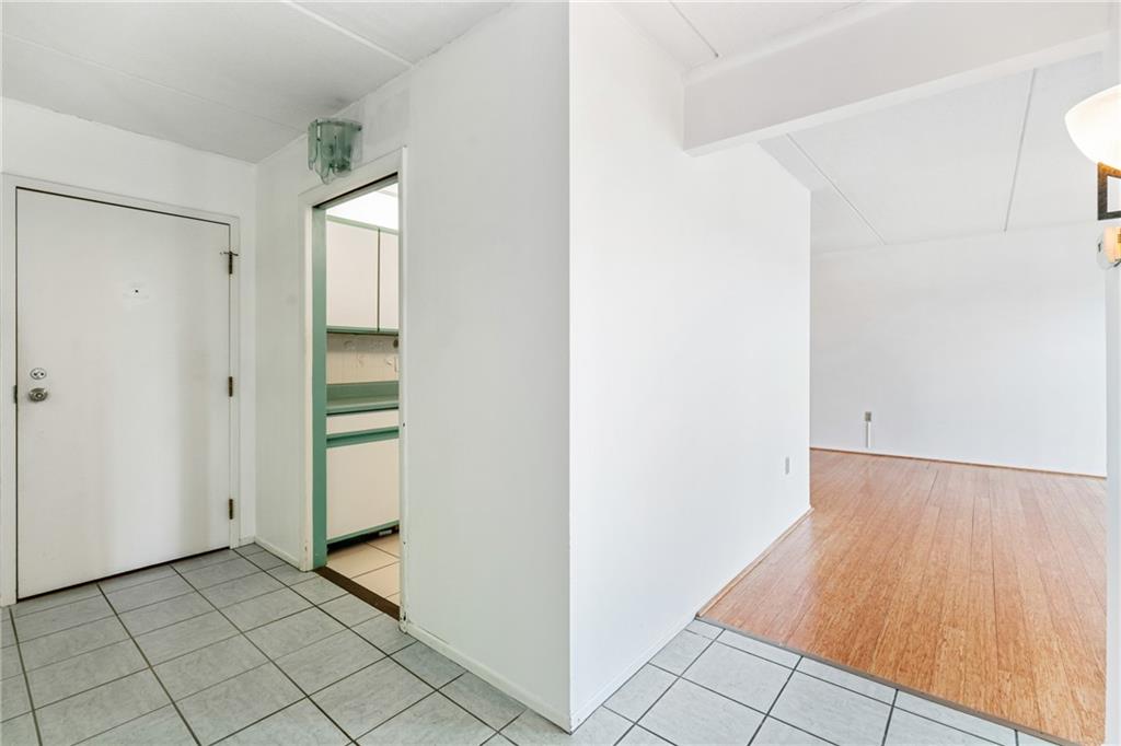 5600 Munhall Road, Unit 606 Pittsburgh, PA 15217 - Photo 16 of 30 a view of a room with wooden floor