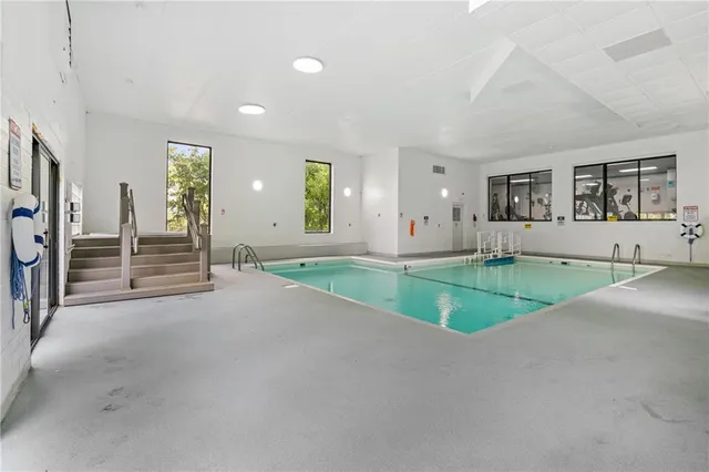 a view of a dining room with furniture window and flowerpot