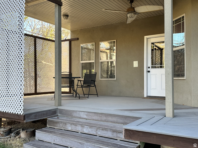 140 North 200 E Street Glenwood, UT 84730 - Photo 44 of 54 Wooden deck with a ceiling fan