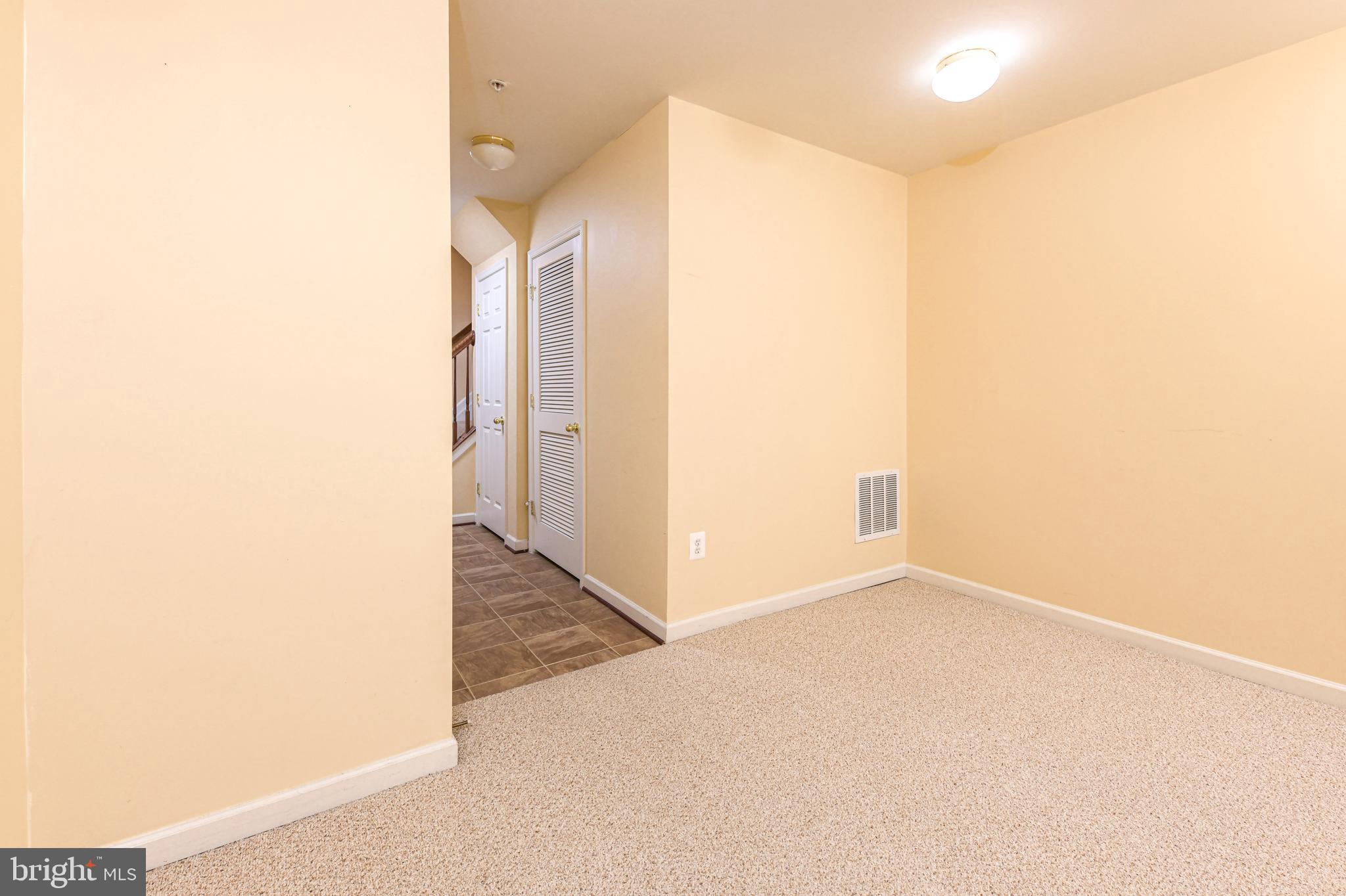 7024 Black Oak Road, Unit 216 Elkridge, MD 21075 - Photo 12 of 30 Primary bedroom - towards bathroom