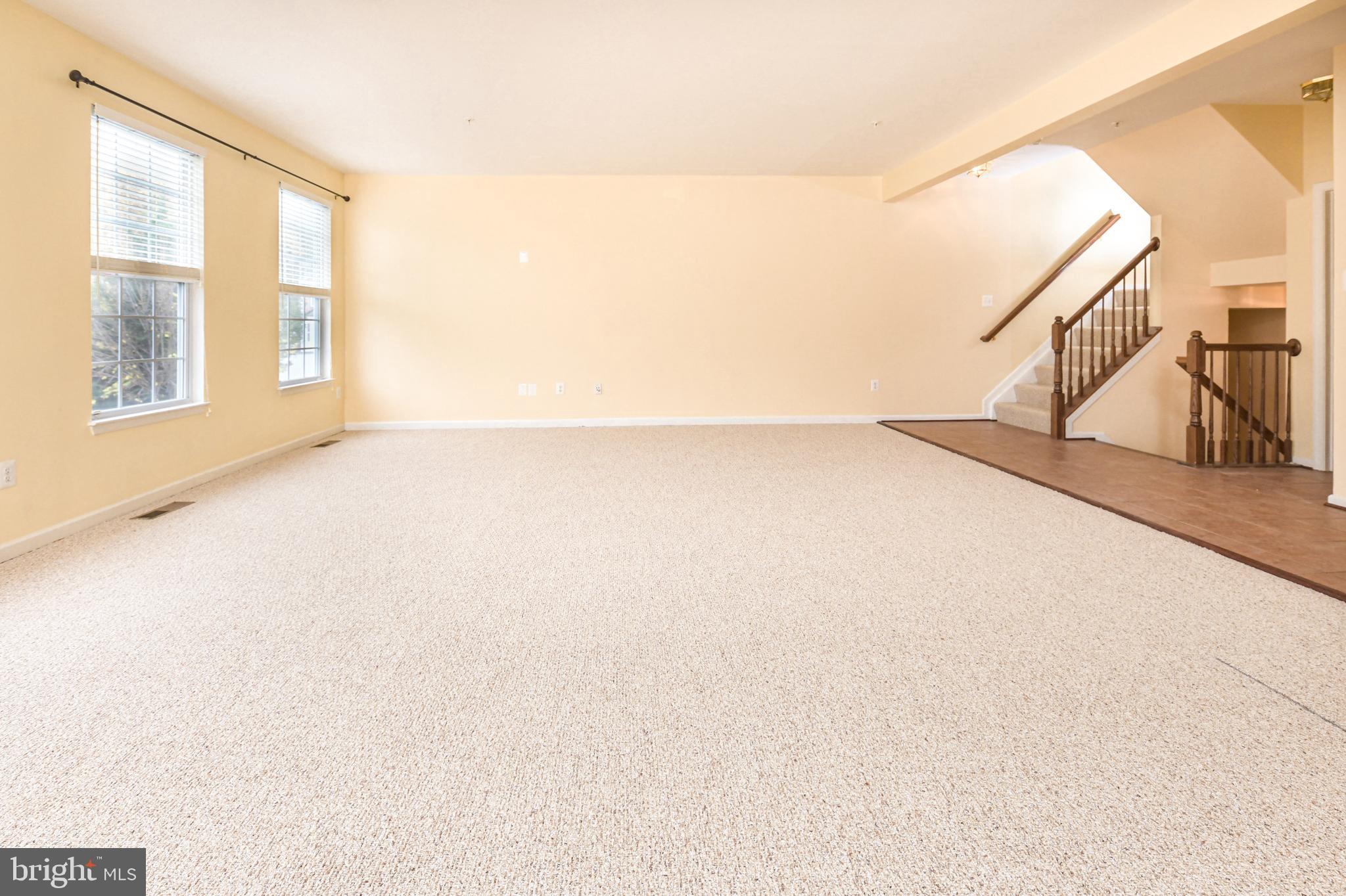 7024 Black Oak Road, Unit 216 Elkridge, MD 21075 - Photo 9 of 30 Living and Dining rooms - view #2