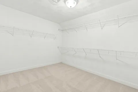 a view of a room with racks on the wall